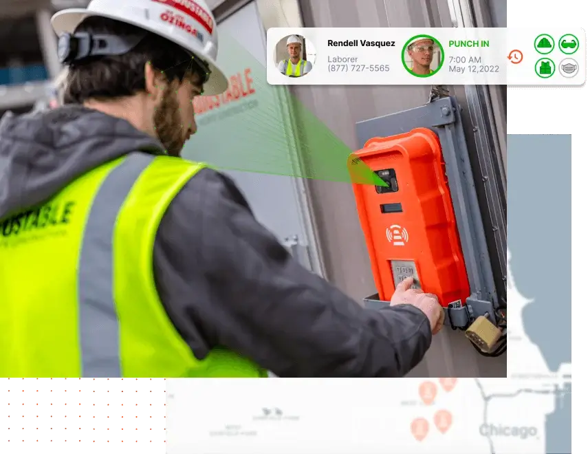 A construction worker using the SmartBarrel device to clock in to their job site.
